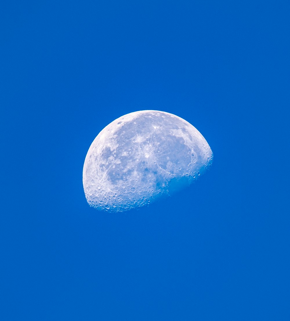 full moon in blue sky