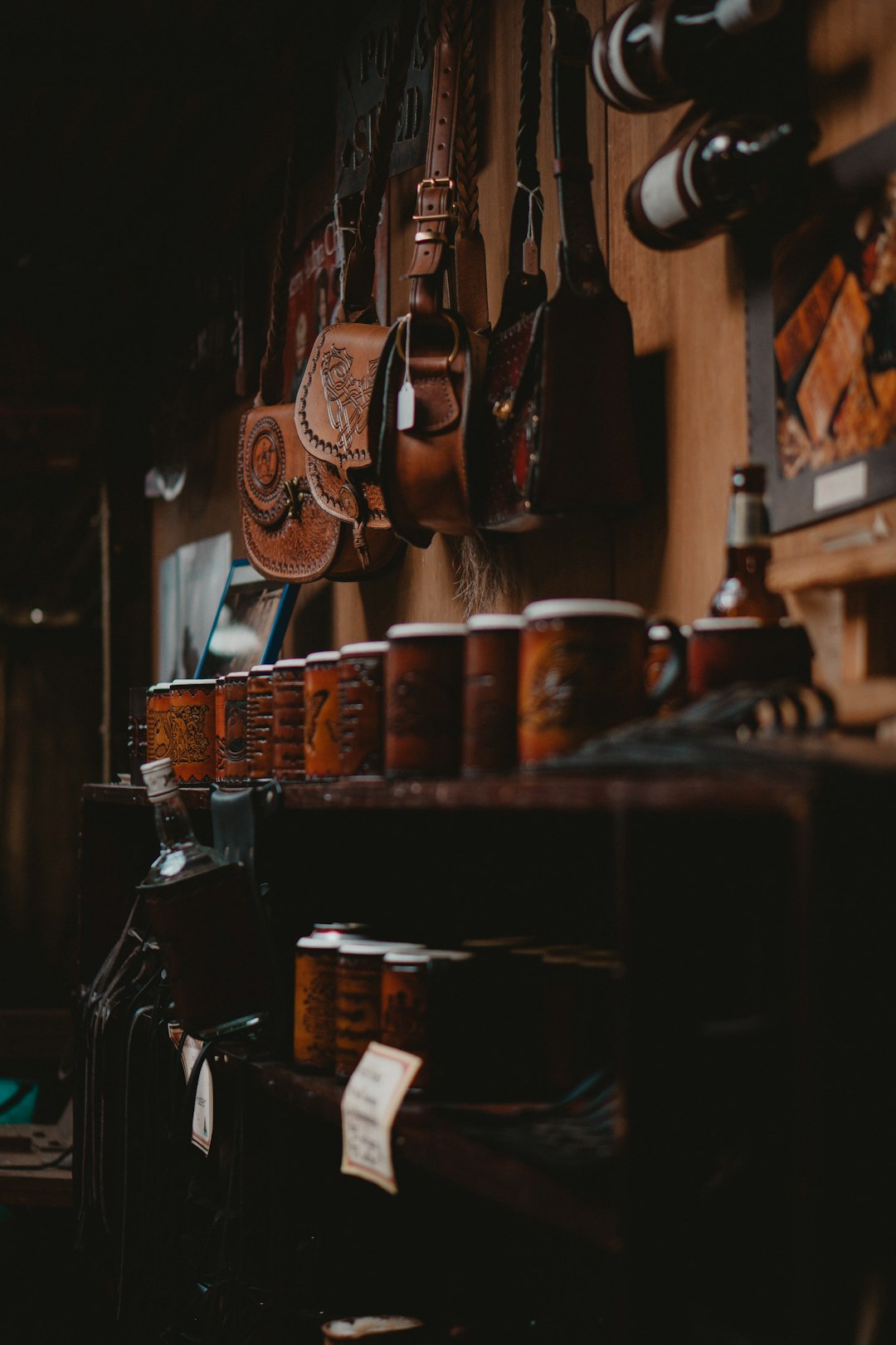 brown wooden shelf with mugs and mugs