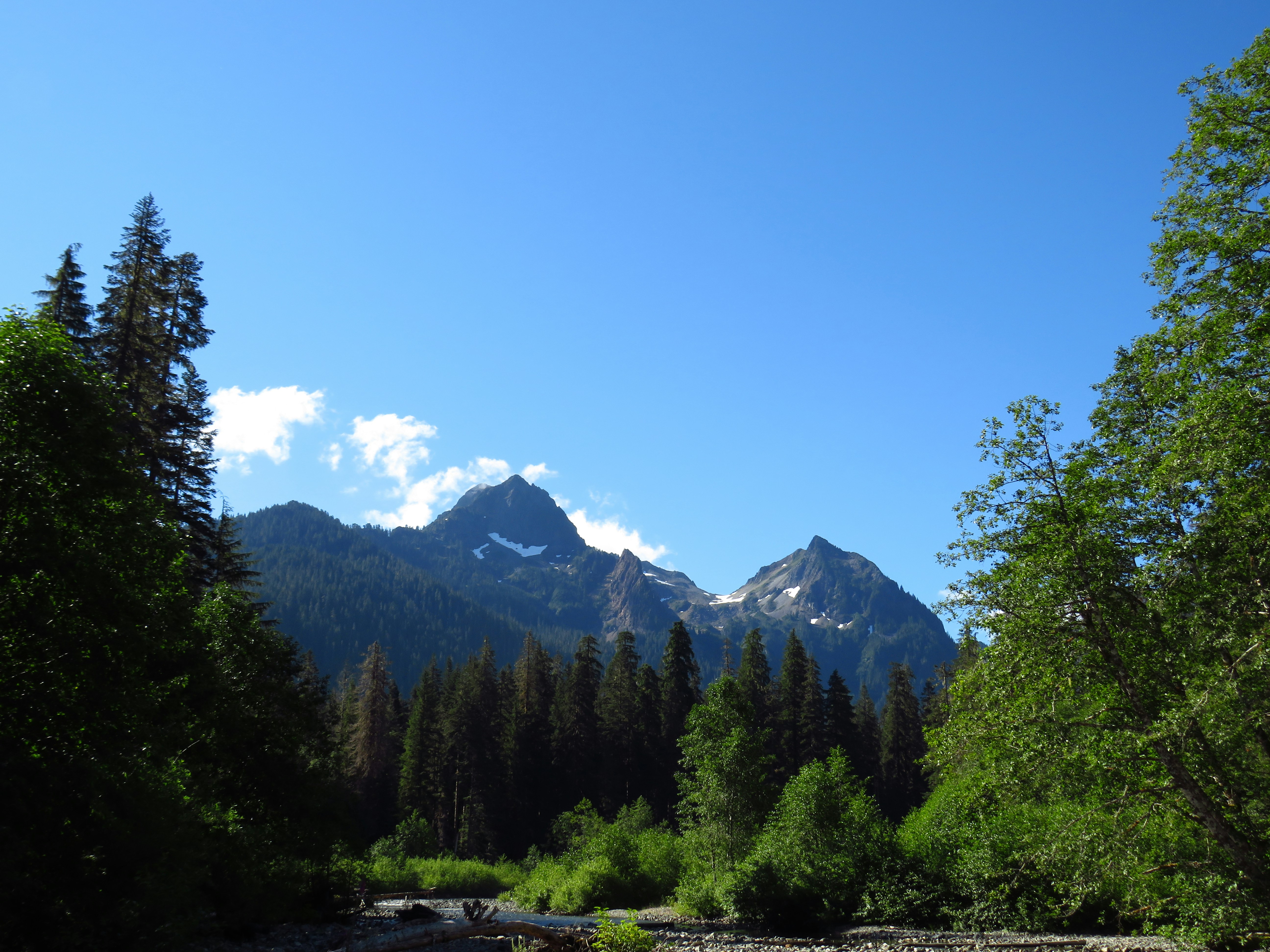 green trees near mountain under blue sky during daytime, Monte Cristo Trail - 8/9/20