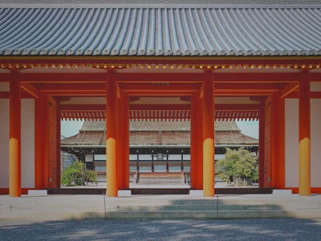 Wide shot of a Japanese-inspired home construction site in Thailand, highlighting traditional woodworking techniques.