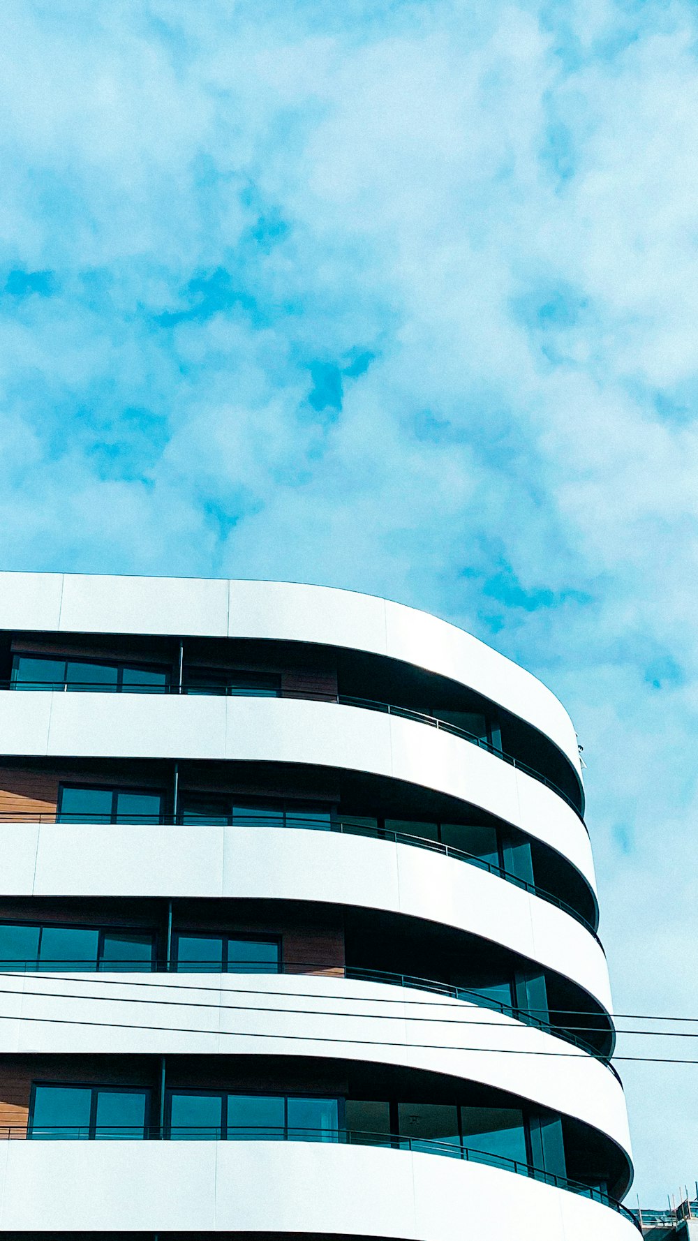 white concrete building under blue sky during daytime