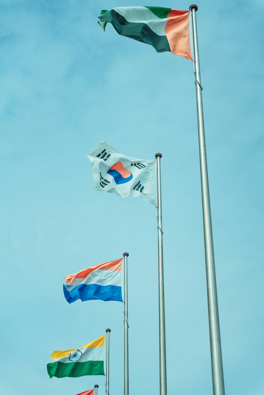 flag of us a on pole during daytime