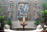 Traditional artwork adorning the walls of the heritage suite creating a serene atmosphere.