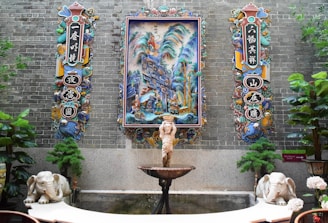 A serene water fountain surrounded by beautifully designed frames.