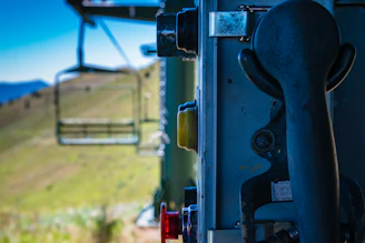 Close-up of a sturdy monitor lift mechanism in action