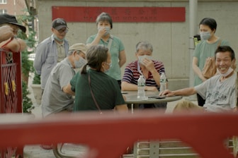 Community members discussing water survey results outdoors