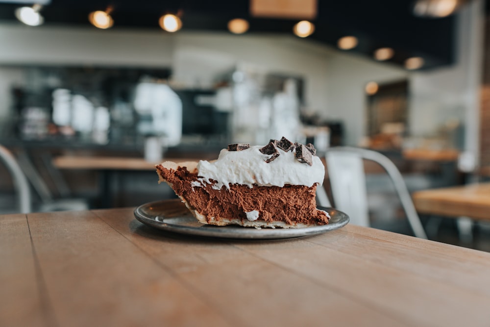 white and brown cake on white ceramic plate