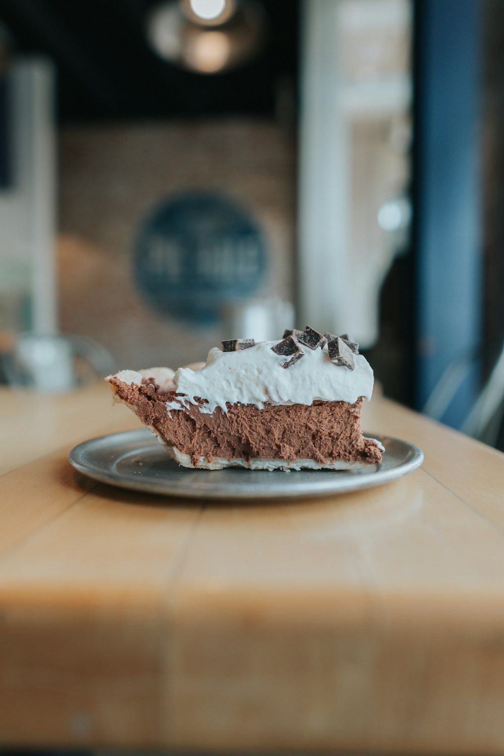 brown and white cake on white ceramic plate