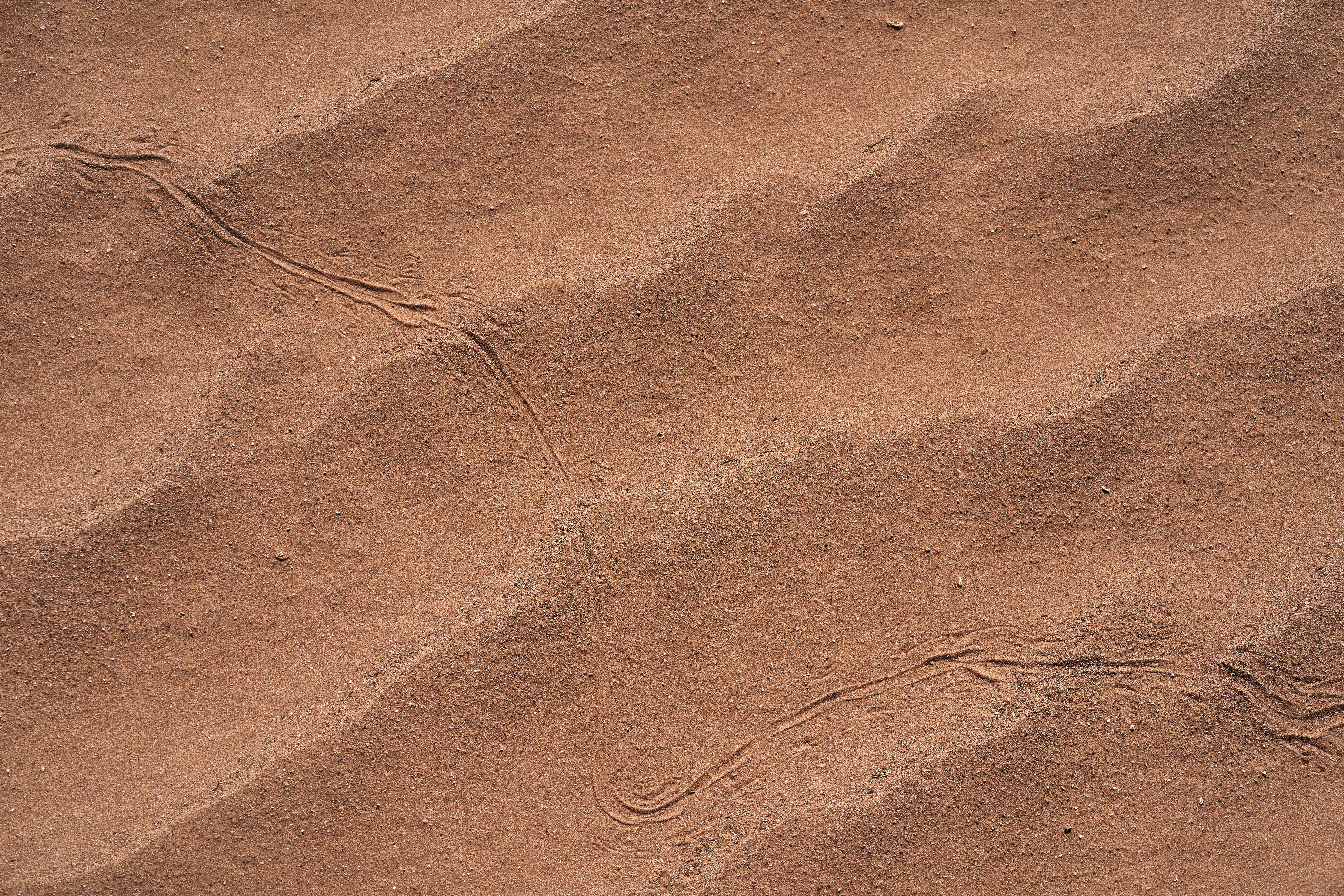 茶色の砂と茶色の砂の写真 Unsplashで見つけるテクスチャの無料写真