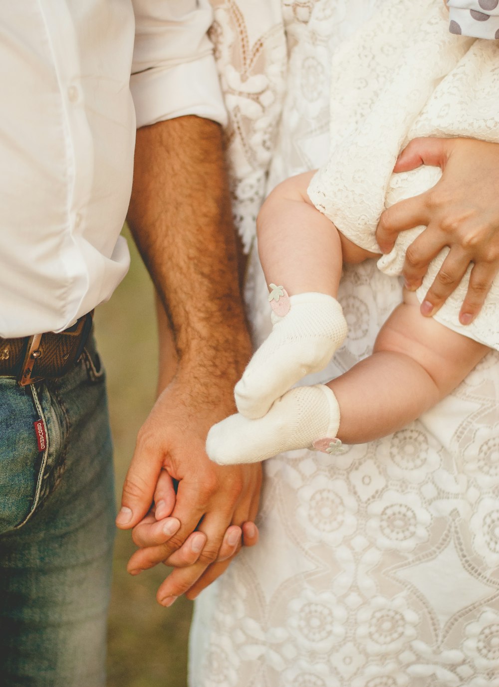 man and woman holding hands together