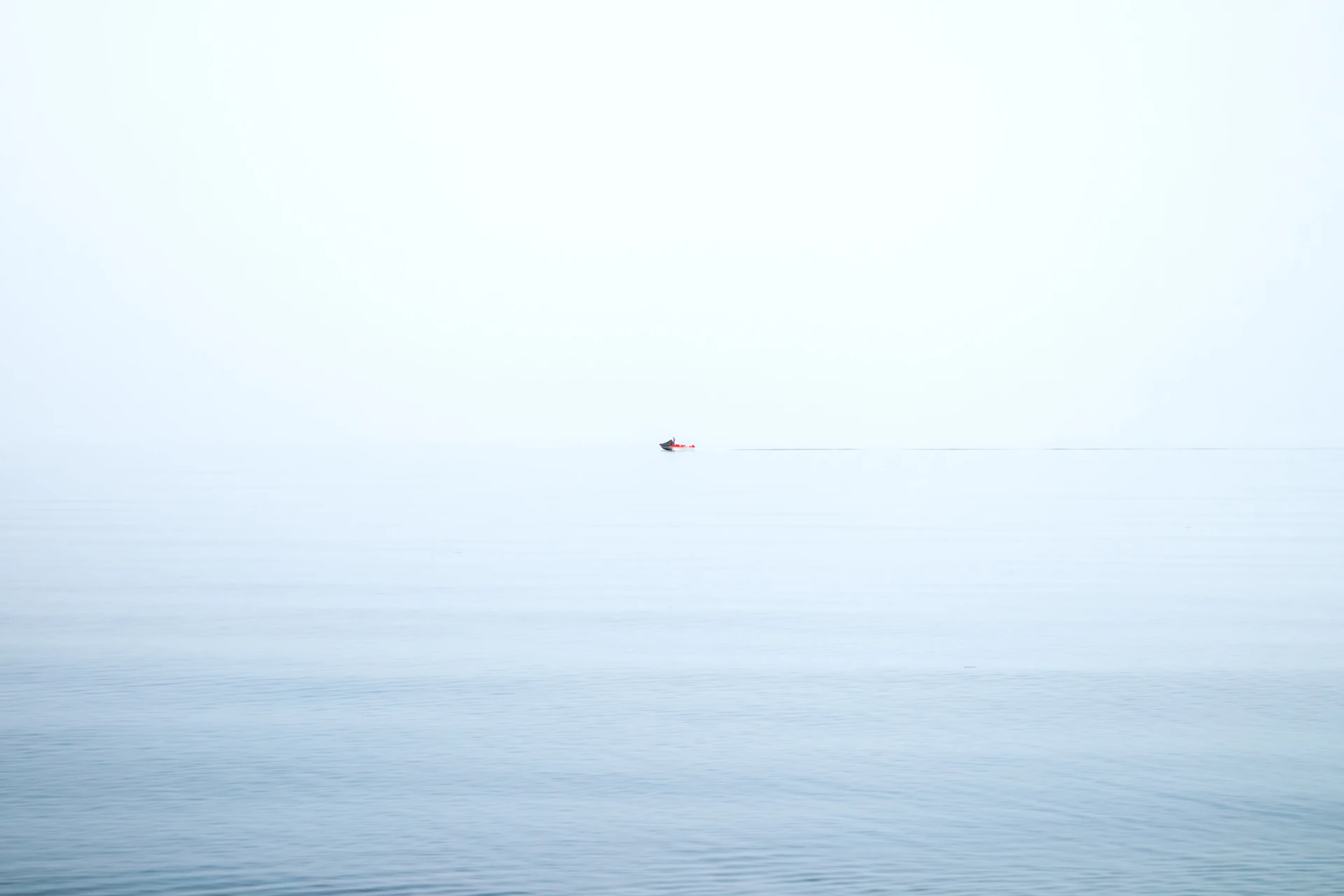 person in the middle of the sea
