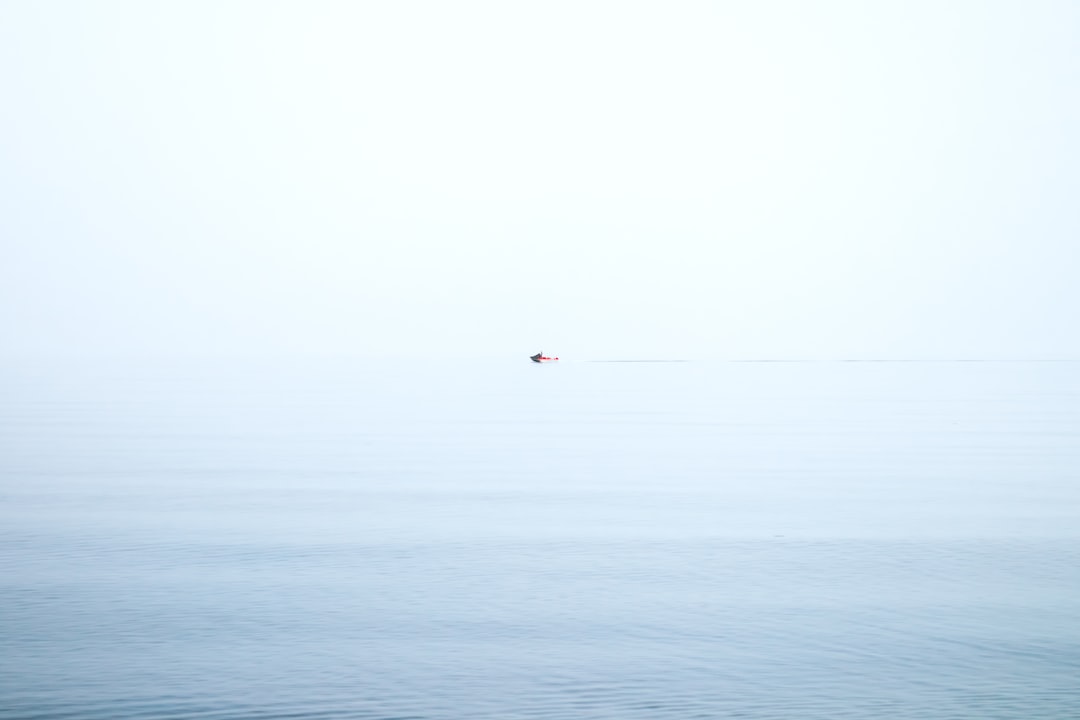 person in the middle of the sea