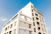 white concrete building under blue sky during daytime