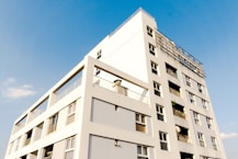 white concrete building under blue sky during daytime