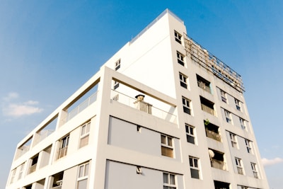 white concrete building under blue sky during daytime