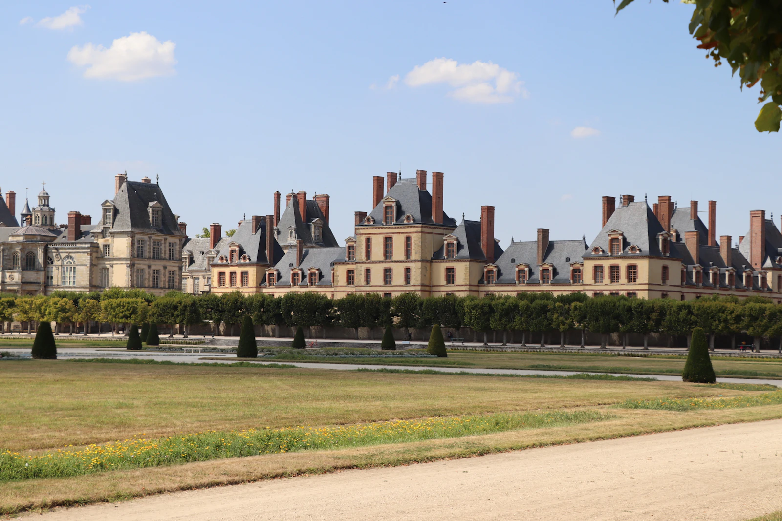 Château de Fontainebleau under a blue sky, Fontainebleau, France