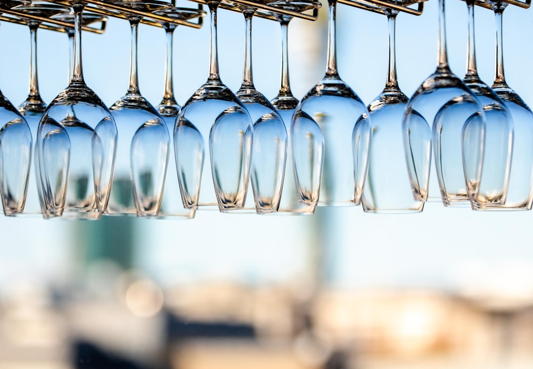 tilt shift lens photography of clear glass bottles,