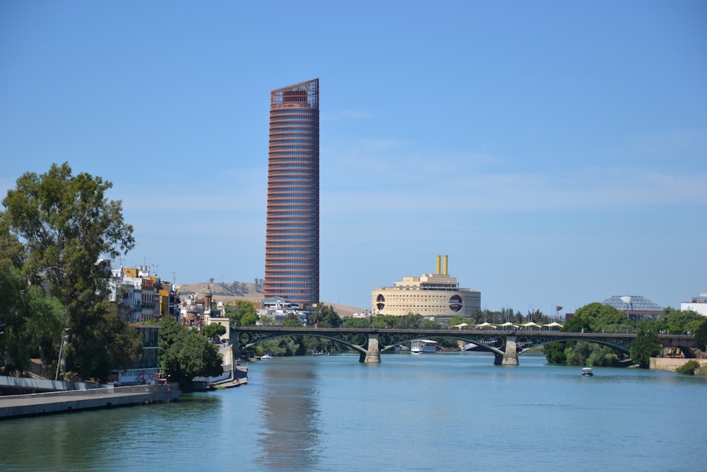 brown concrete building near body of water during daytime