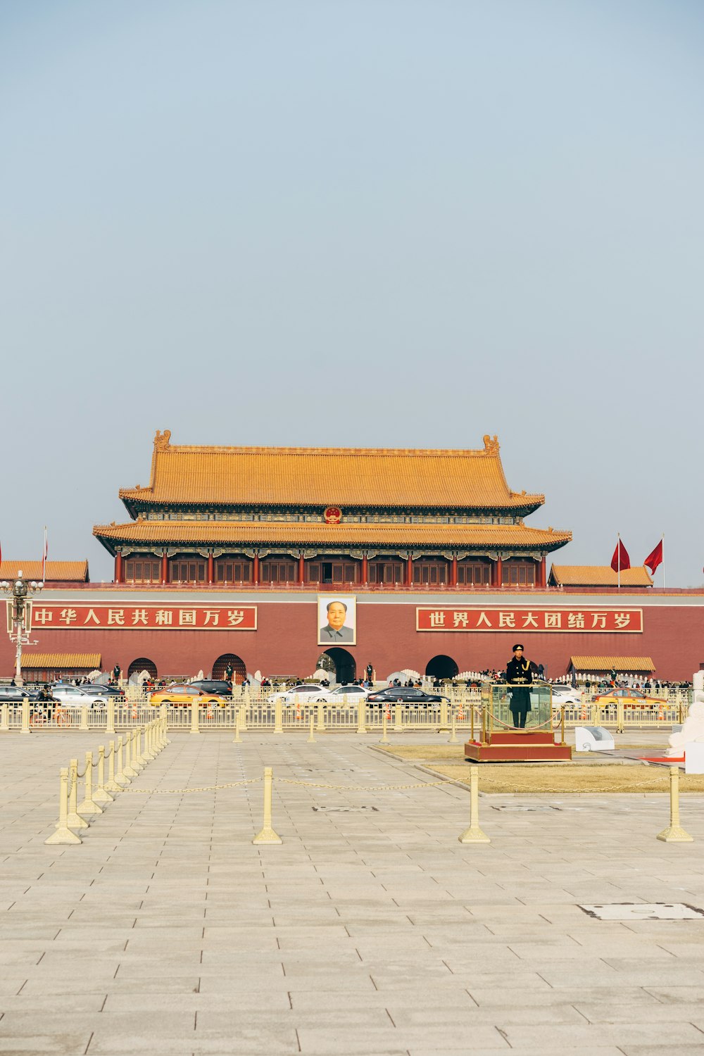 people walking on red and brown temple during daytime