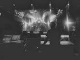 Sound engineer adjusting mixing console during a live music performance