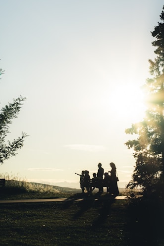 man and woman riding motorcycle on road during daytime