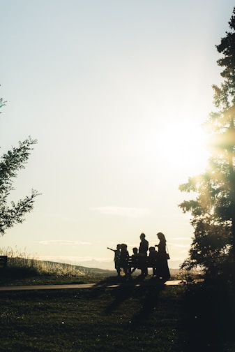 man and woman riding motorcycle on road during daytime