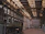 Wide shot of a spacious industrial warehouse with a freshly coated polyspartic floor.