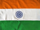 white orange and green striped flag