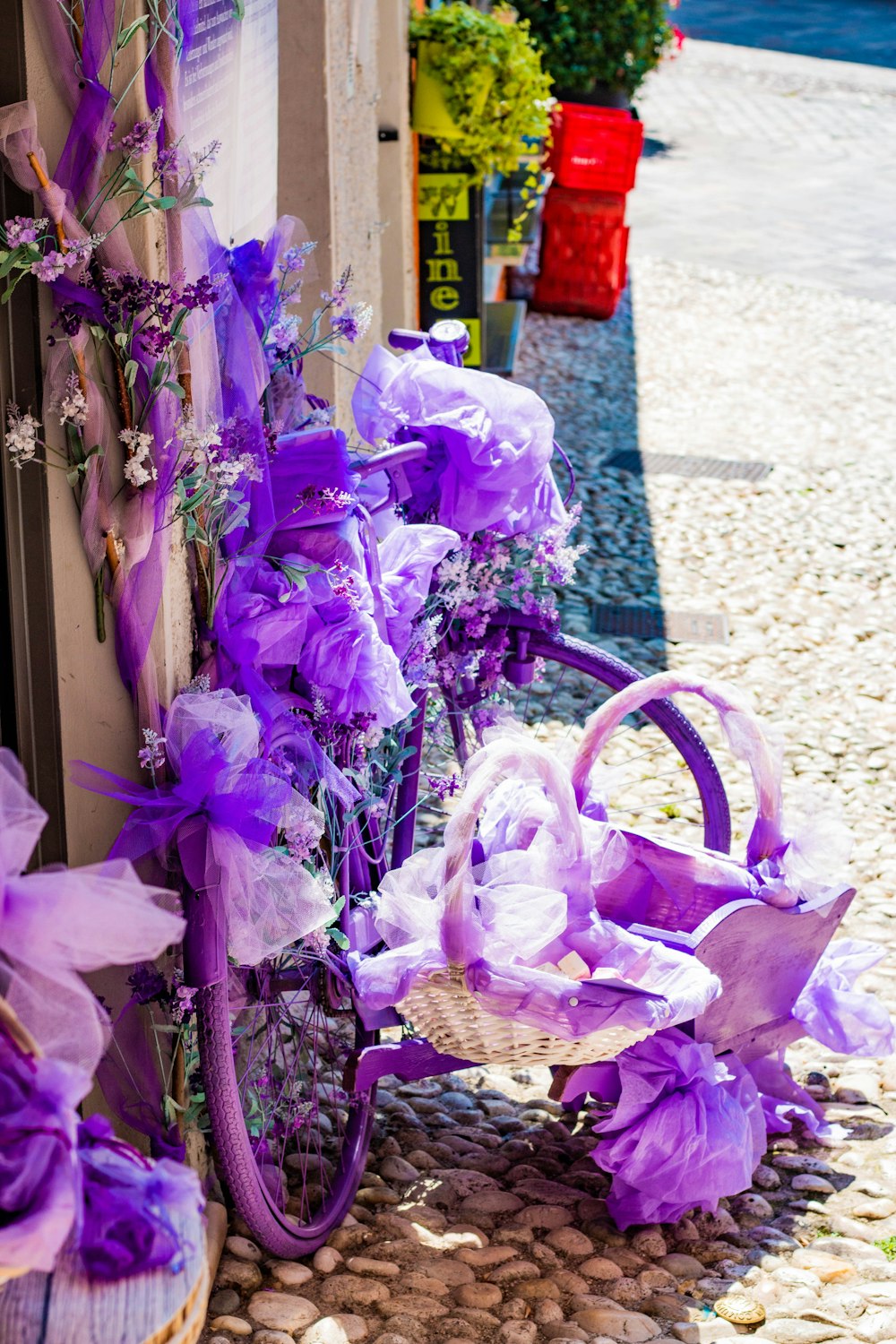 purple flowers on brown woven basket