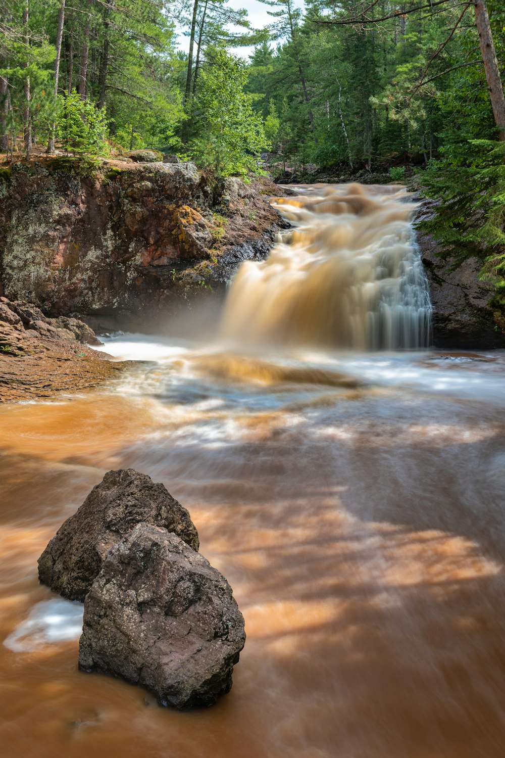 time lapse photography of waterfalls