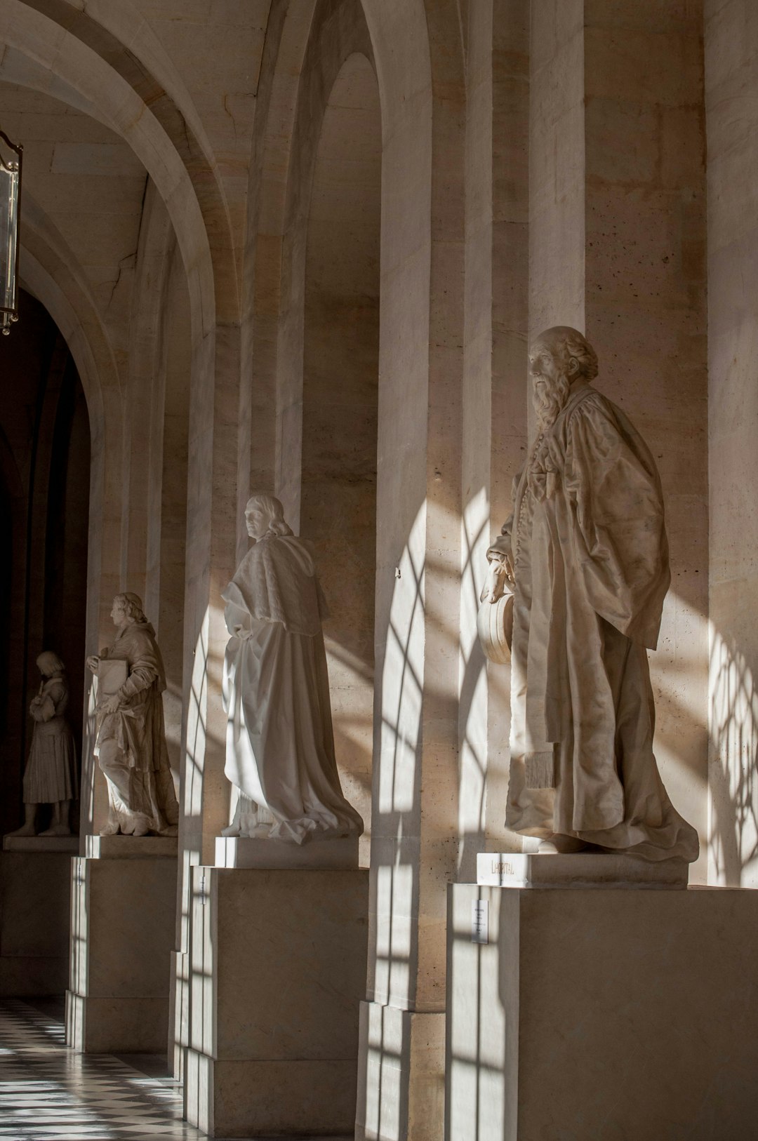 man in white robe statue