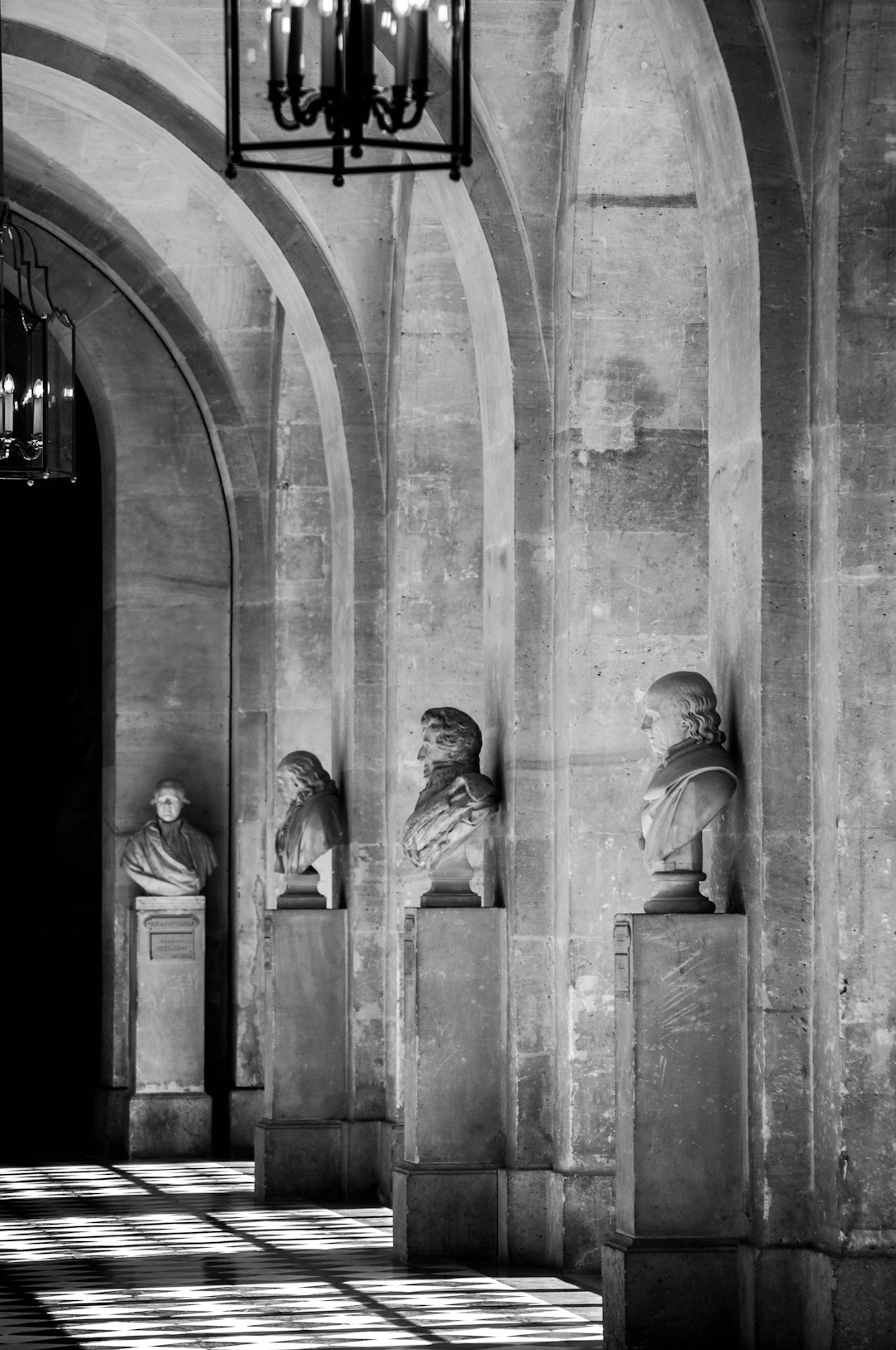 grayscale photo of 2 men statue