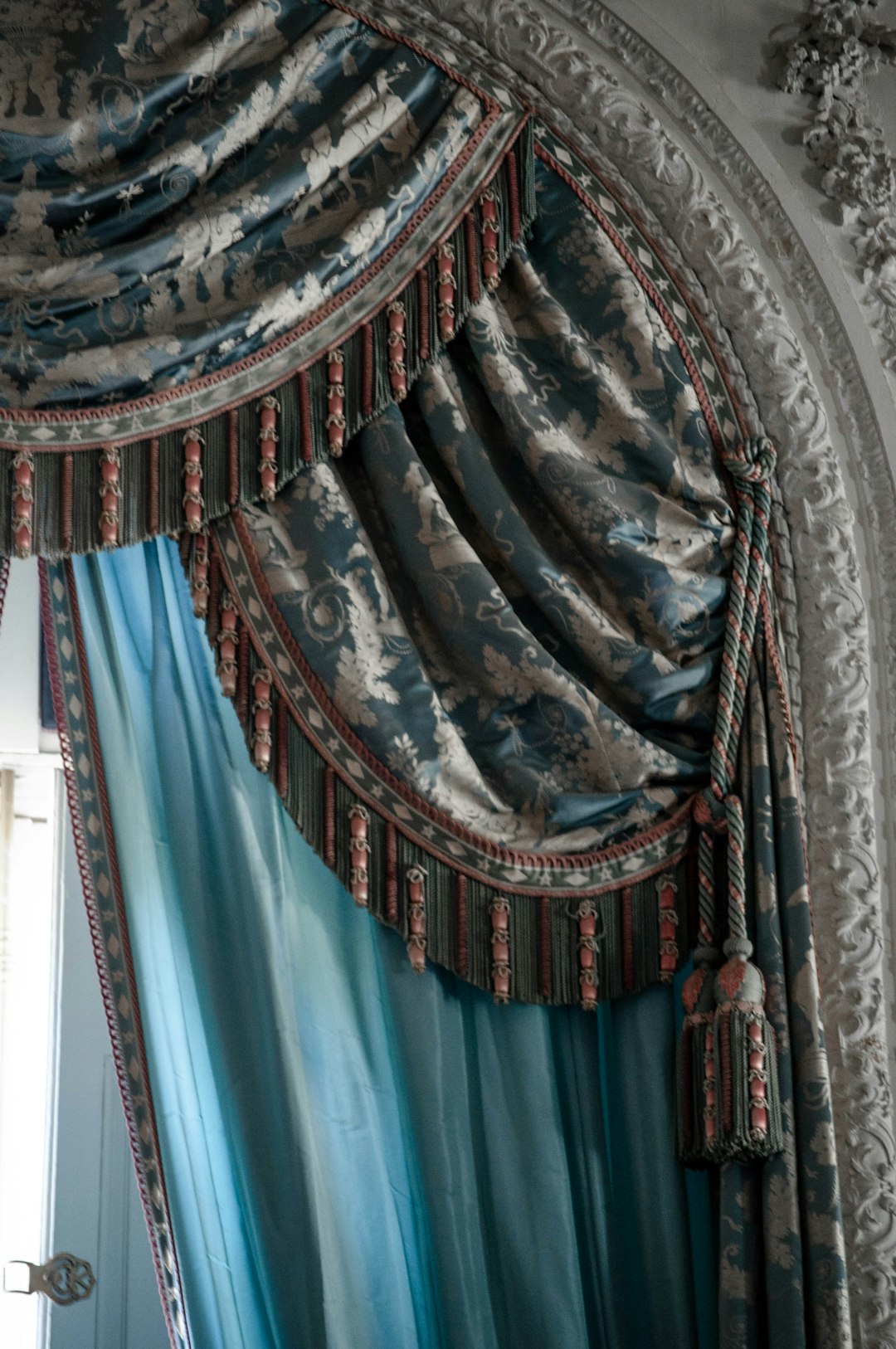 blue and brown window curtain