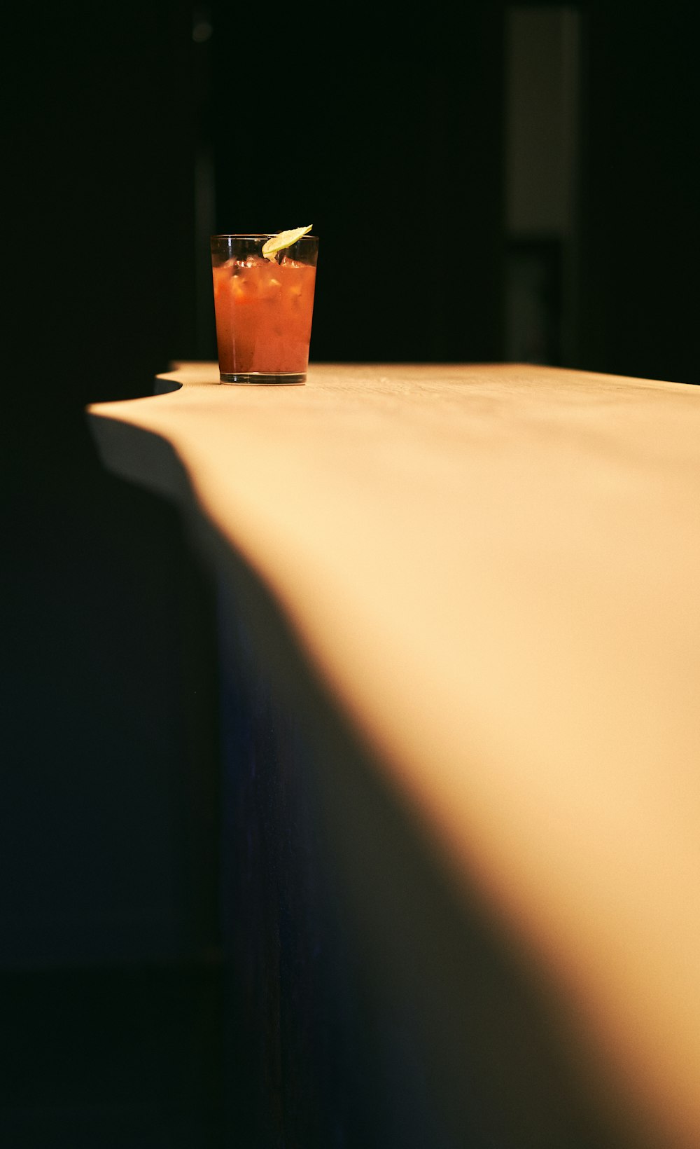 clear drinking glass on white table