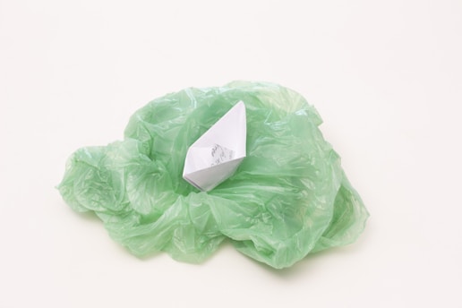 green plastic pack on white surface