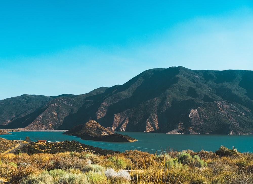 a large body of water surrounded by mountains