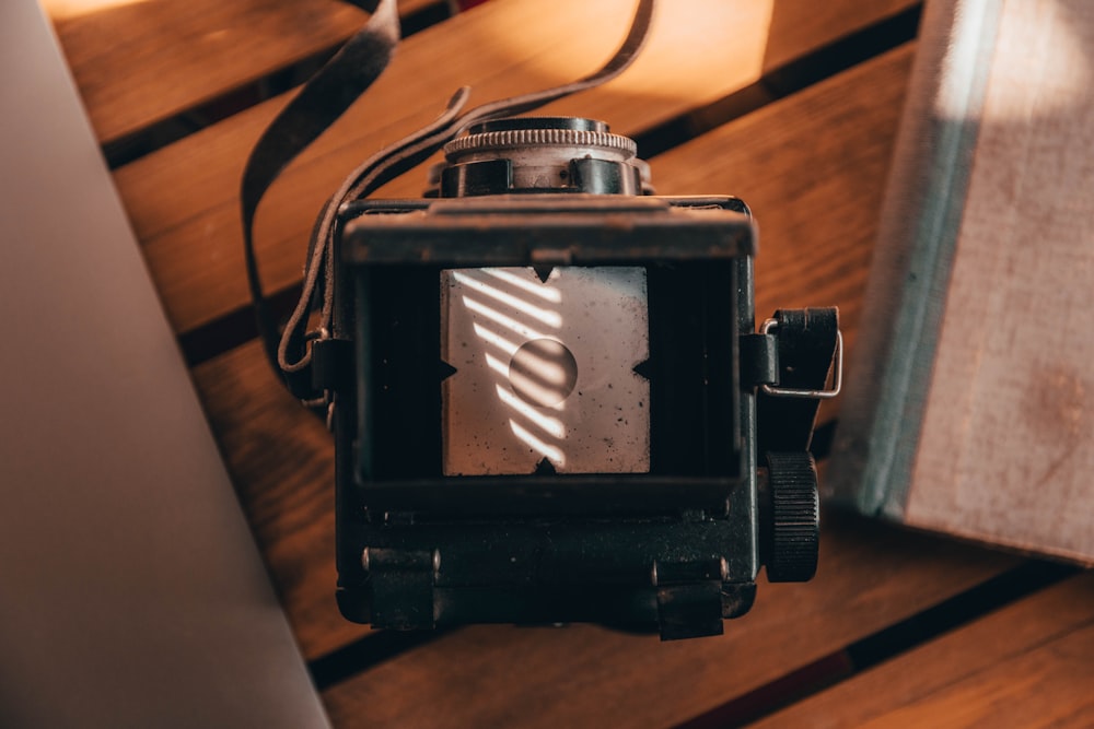 black and silver vintage camera