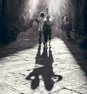 Black and white photo capturing the founders walking through Paris streets at dawn.