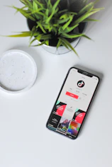 iphone xs on white table
