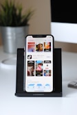 iphone xs on white table