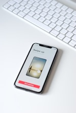 iphone xs on white table