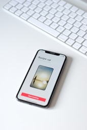 iphone xs on white table