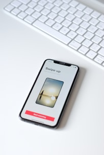iphone xs on white table