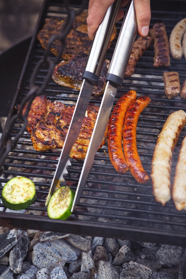 Grilled sausage on black grill