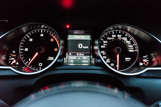 black and white analog speedometer