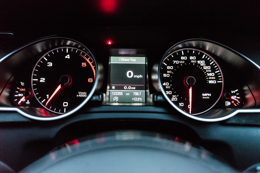 black and white analog speedometer