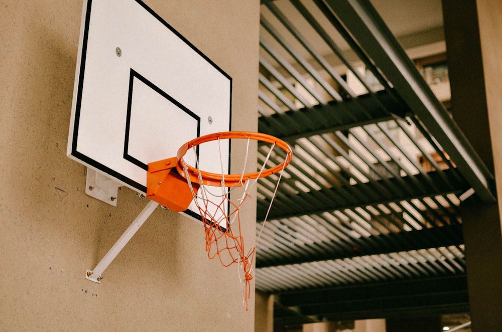 white and orange basketball hoop