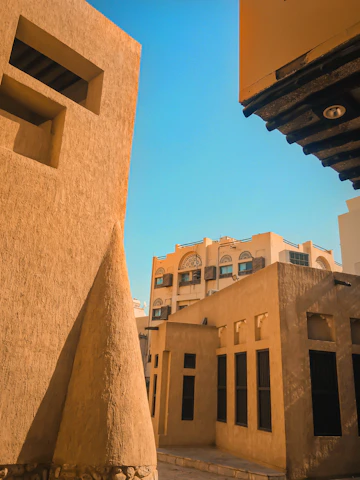Warm, welcoming image of a traditional Tangier street scene with subtle cultural elements that evoke trust and community.