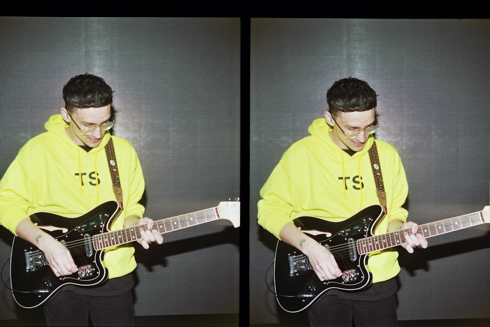 man in yellow polo shirt playing white and black stratocaster electric guitar