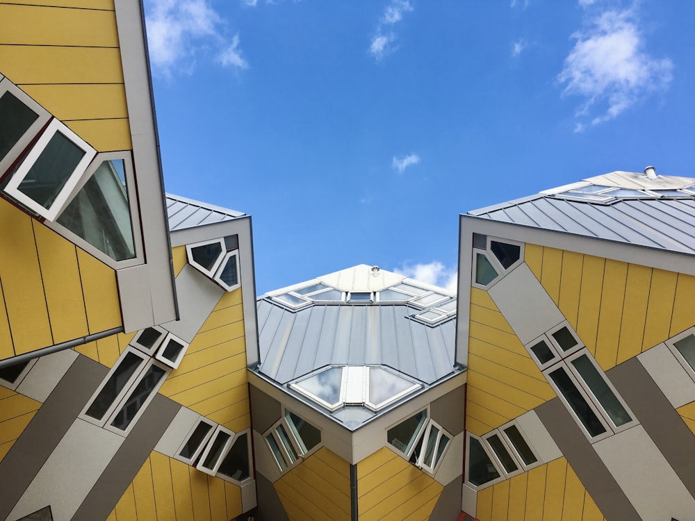 brown and white concrete building under blue sky during daytime